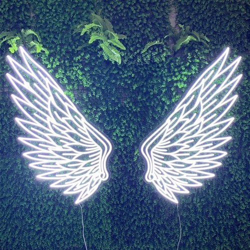 White LED Neon Wings on vertical garden